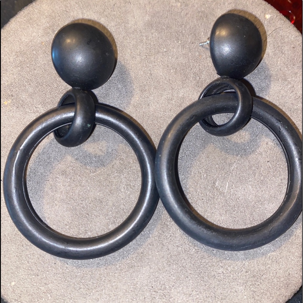 3” knocker style titanium earrings. Pierced ears. Very lightweight and matte